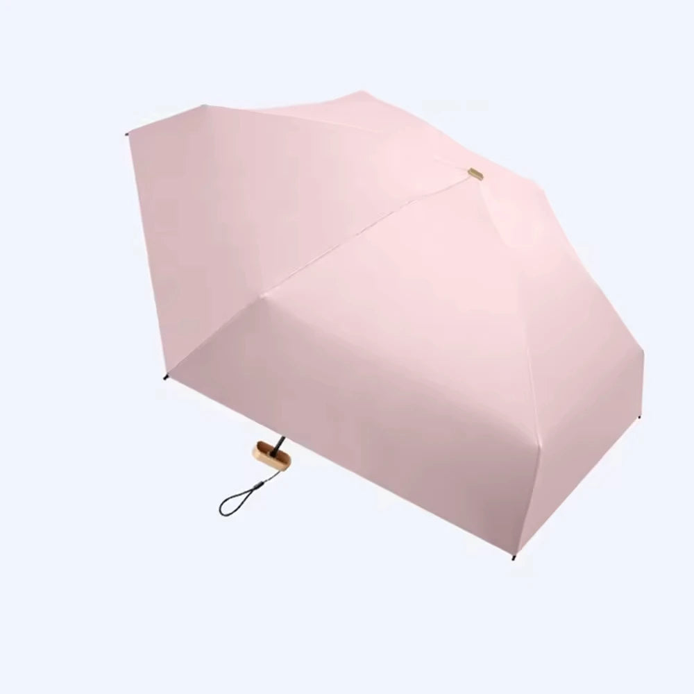 Mini Pocket Umbrella — Foldable, UV & Rain Ready